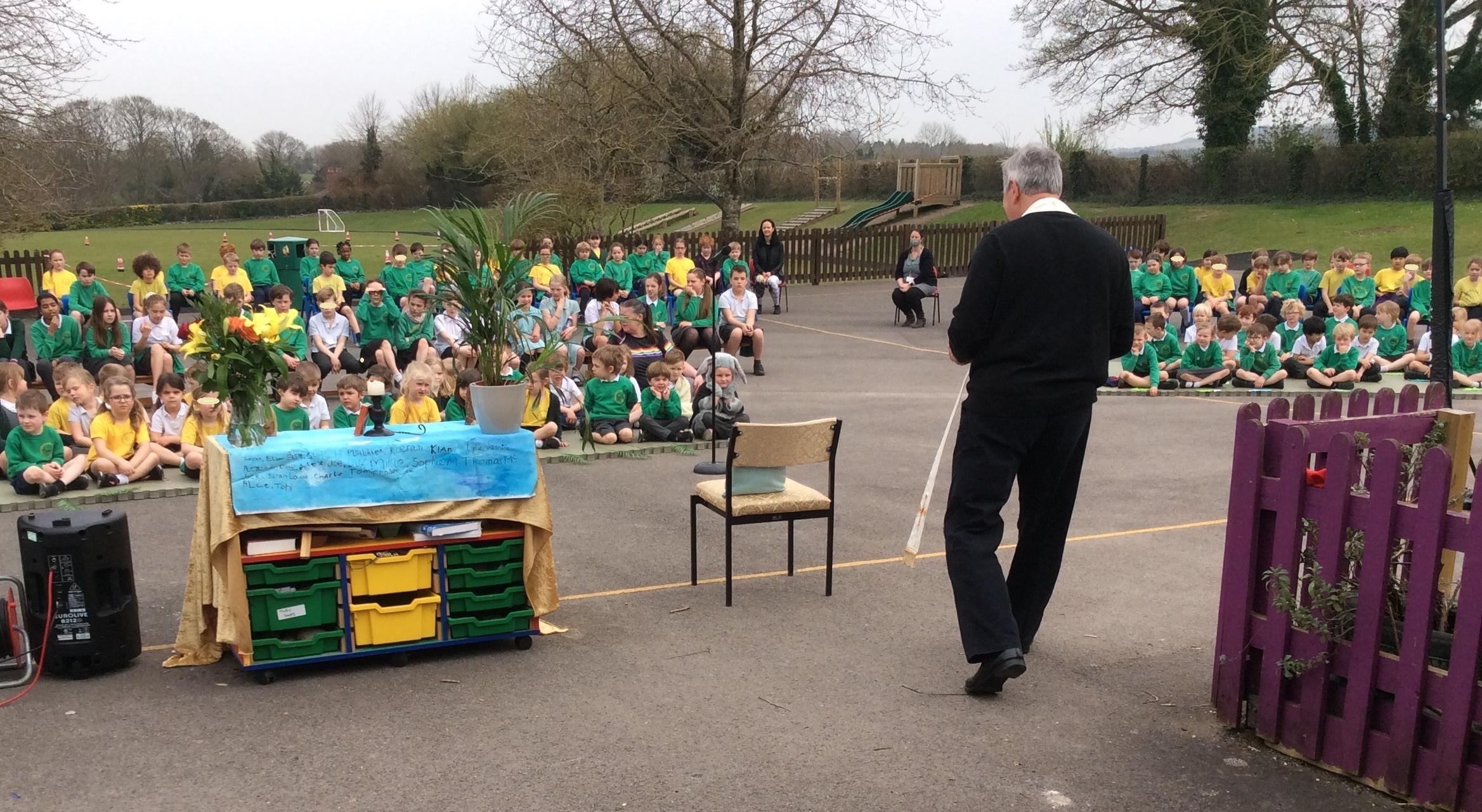 Rev Peter leading outdoor worship